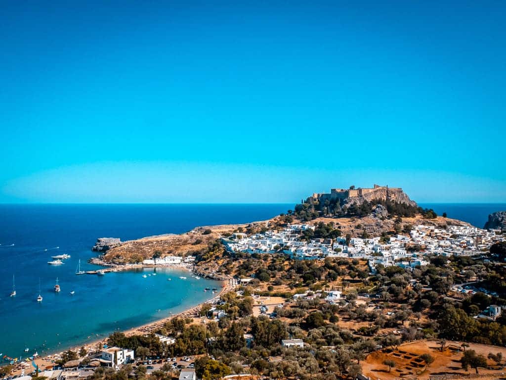 Lindos village Greece whitewashed houses and blue bay