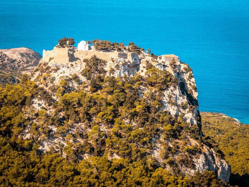 Monolithos Castle Rhodes building sittin on top of a hill